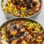 Delicious grilled chicken mashed potatoes bowl topped with fresh herbs