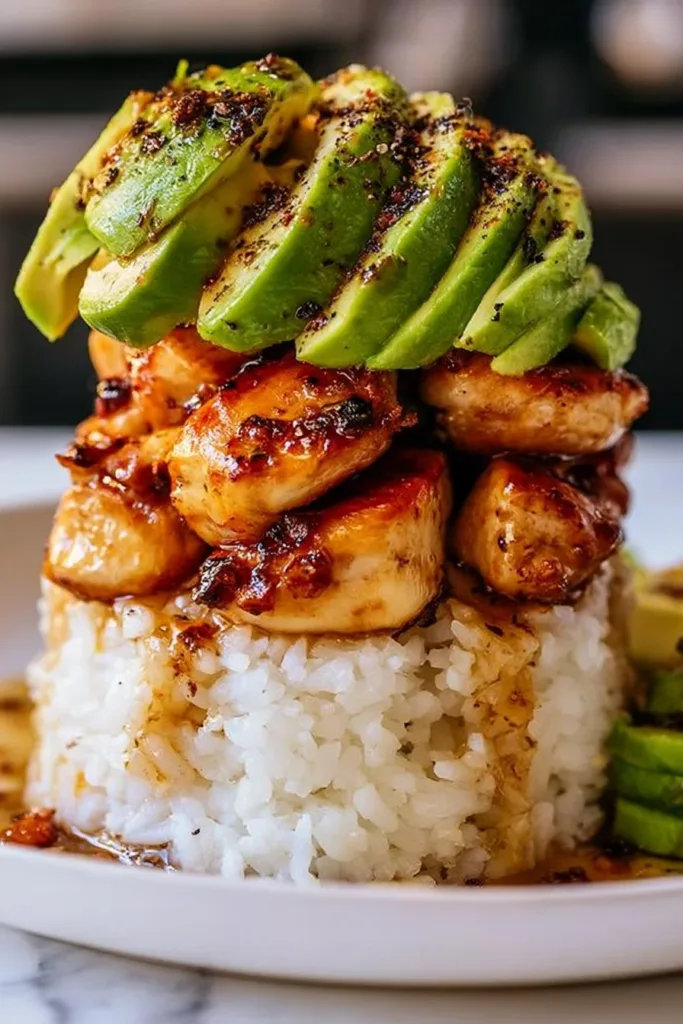 Delicious honey lime chicken served with avocado rice on a plate