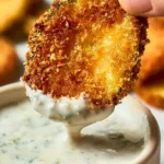 Crispy air fryer zucchini chips served in a bowl, healthy snack option